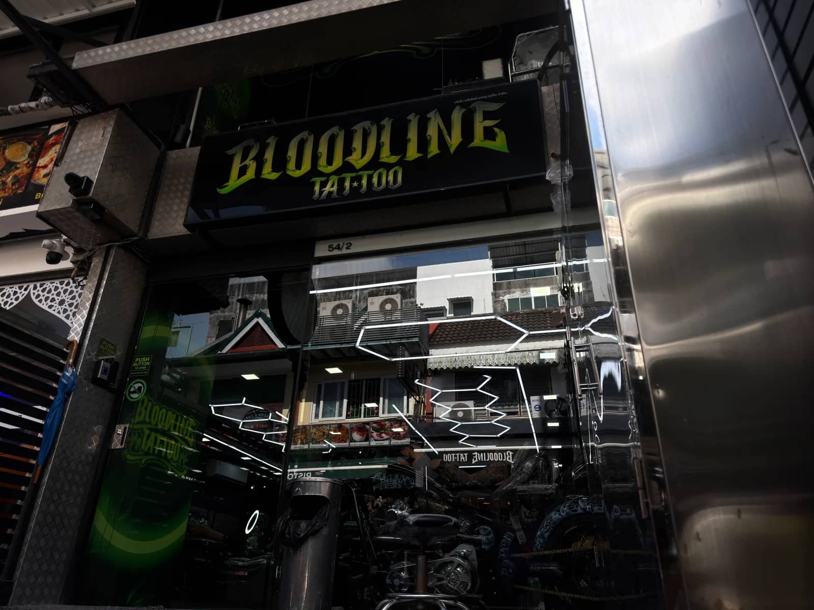 Bloodline Tattoo Phuket studio exterior on the street with signage visible