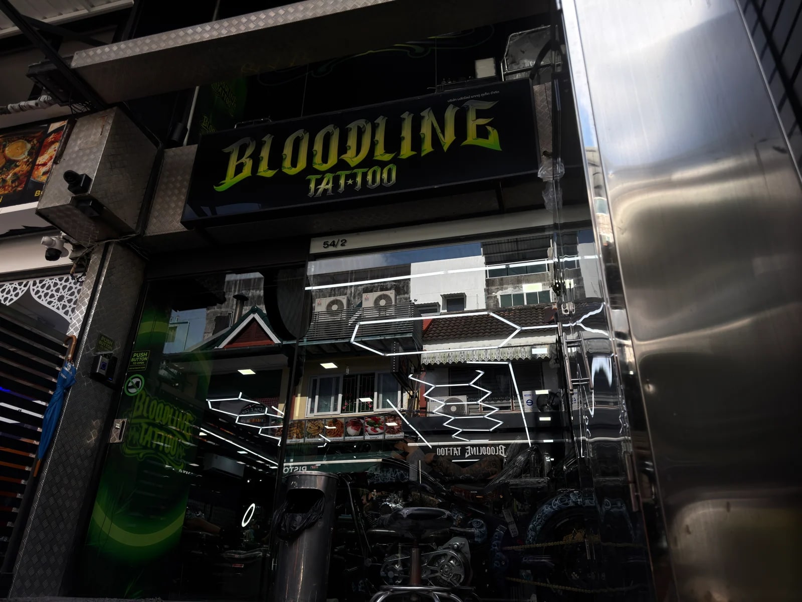 Bloodline Tattoo Phuket studio exterior on the street with signage visible