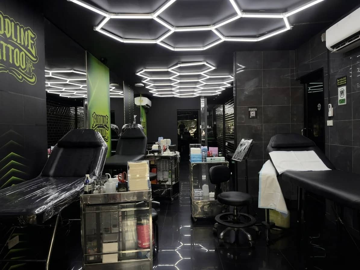 Professional tattoo studio in Phuket Thailand with quality equipment and hexagonal lighting