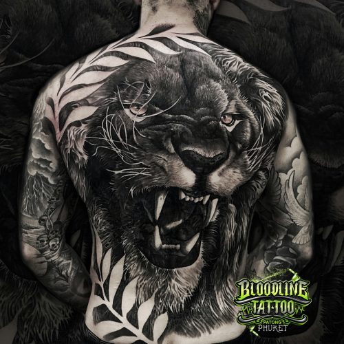 Lion Back Realistic Tattoo Design